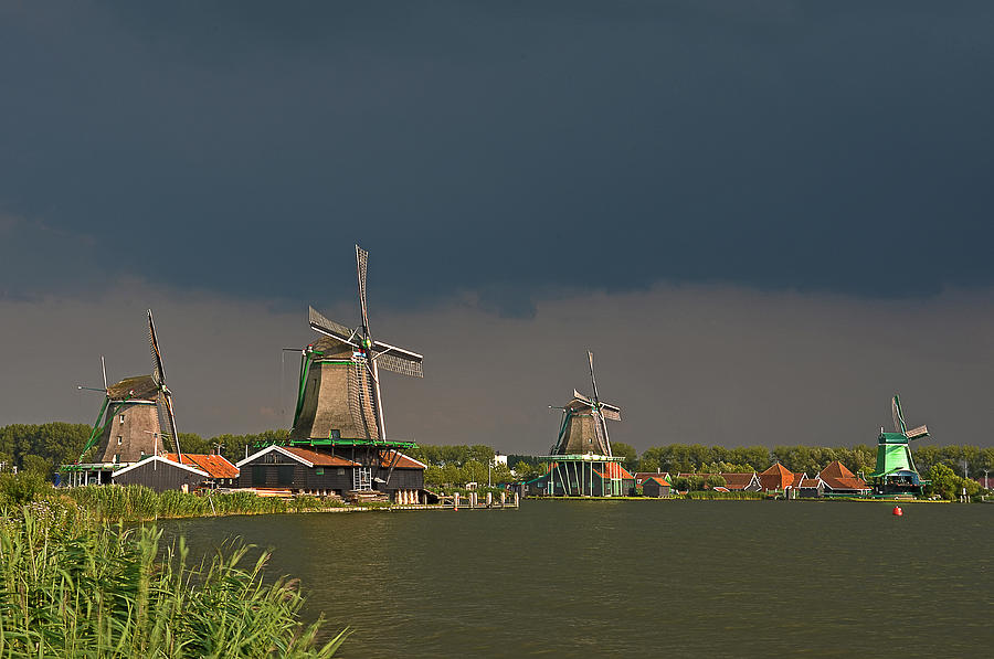 Dark clouds above Zaanse Schans Photograph by Frans Blok