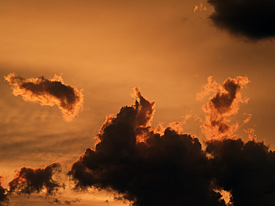 Dark Clouds Looming Photograph by Bob Johnson