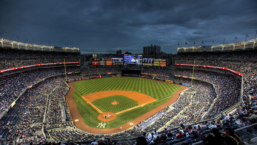 Yankee Stadium Photograph - Dark Clouds over Yankee Stadium  by Shawn Everhart