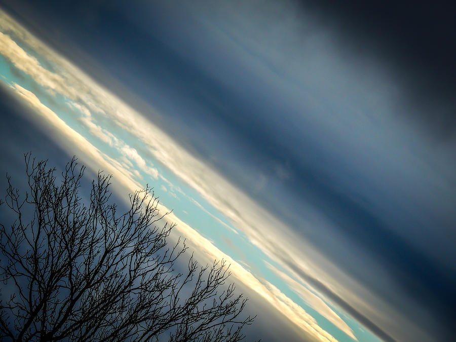 Dark Clouds Parting Photograph by James Truett