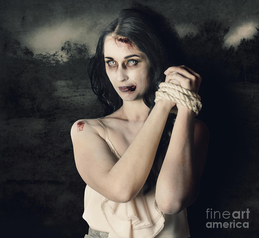 Dark horror scene of an evil zombie woman tied up Photograph by Jorgo Photography