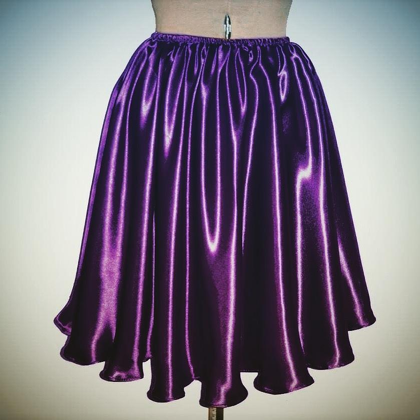 Satin knee-length skirt. Ameynra design. Purple bicolor Photograph by ...