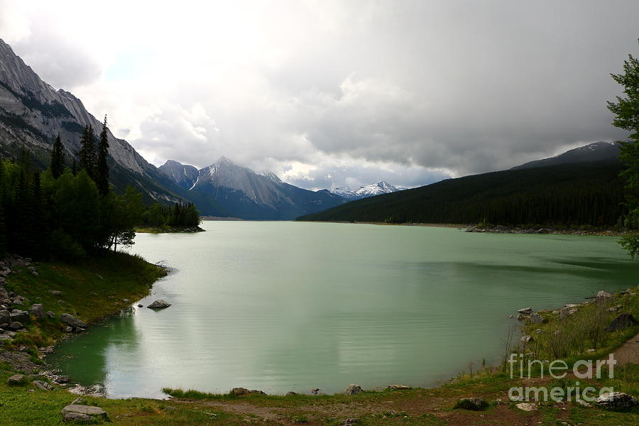 Summer Photograph - Dark Skies Over Medicine Lake by Christiane Schulze Art And Photography