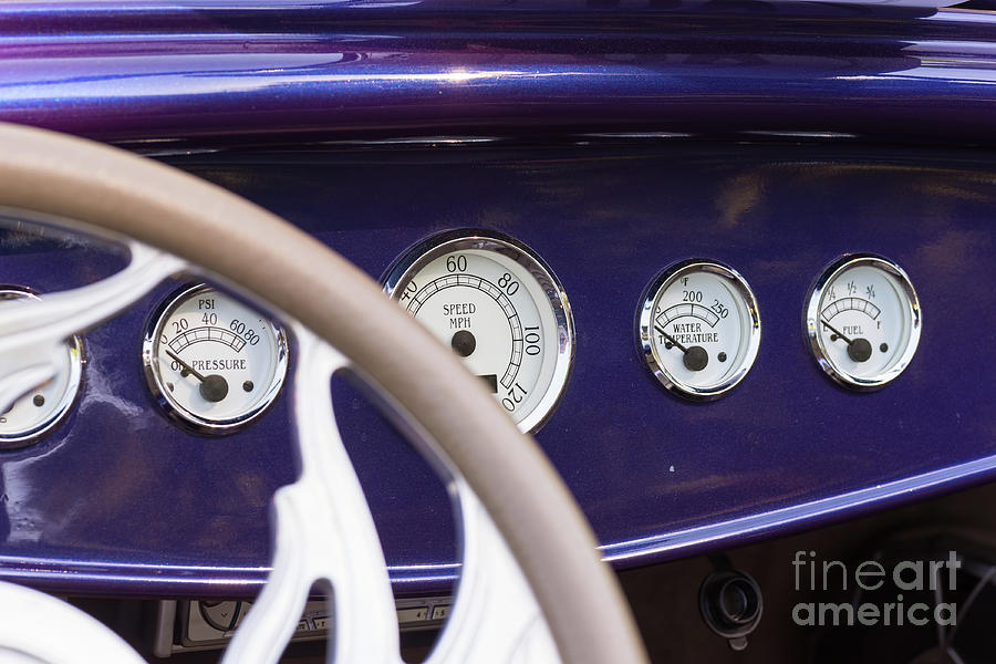 Dashboard in a vintage car Photograph by Les Palenik