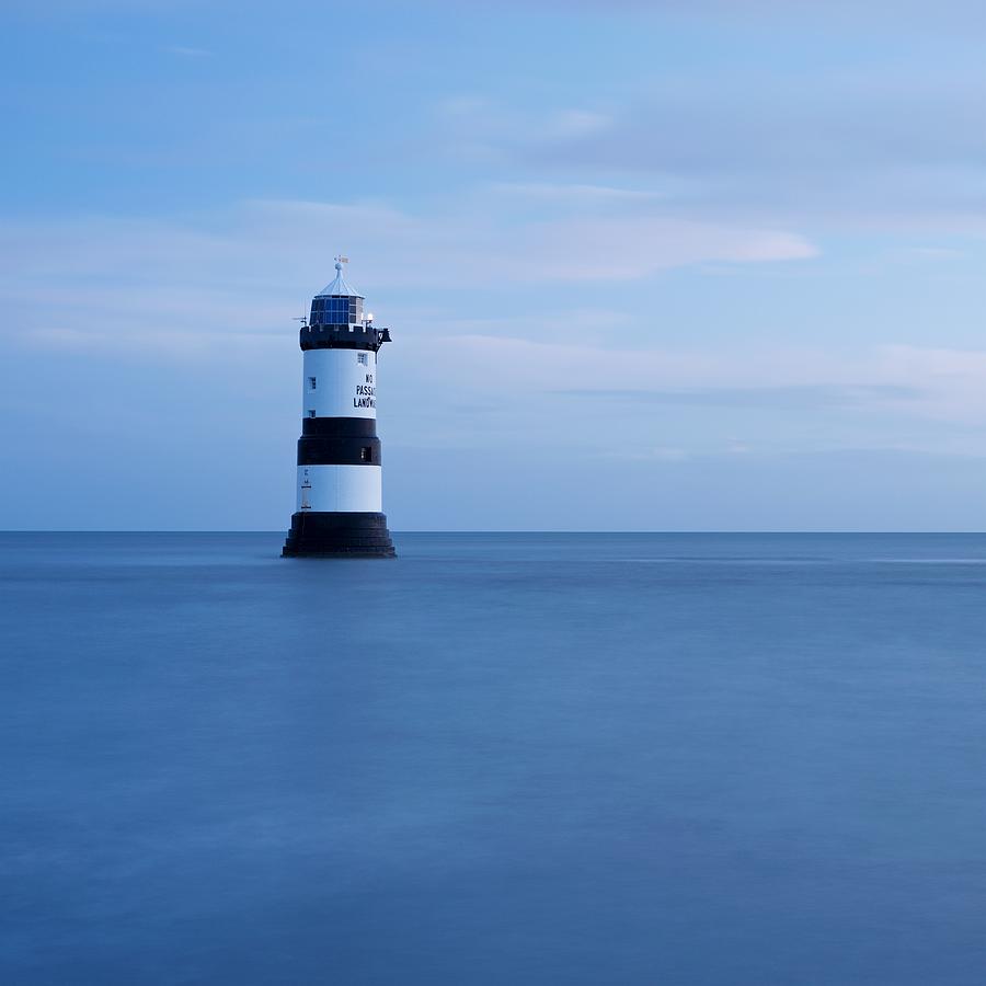Dawn at Penmon Lighthouse Photograph by Stephen Taylor