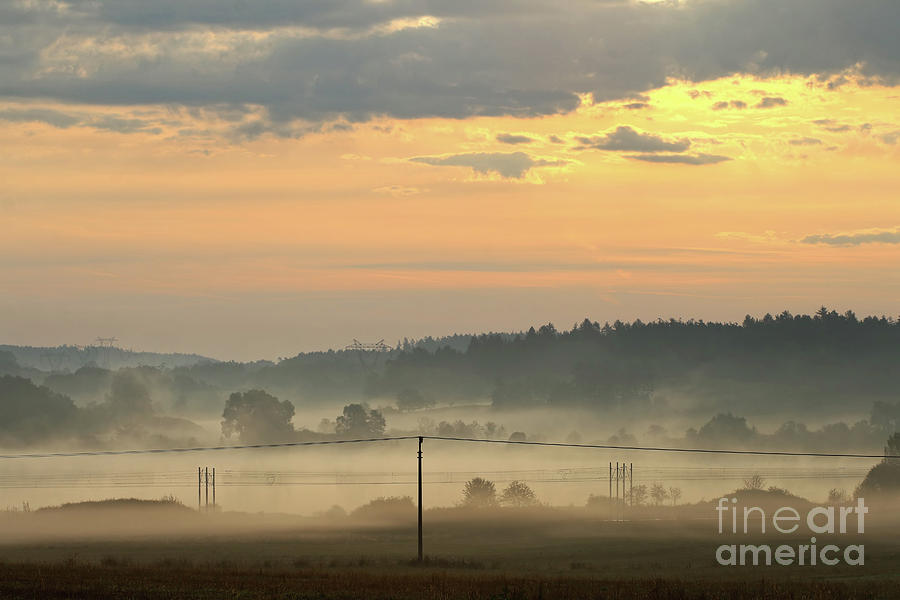 Dawn over rural countryside Photograph by Michal Boubin