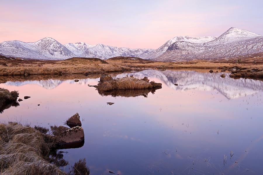 Dawn reflections of the Black Mount Range Photograph by Stephen Taylor