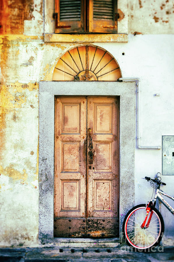 Decayed door and bicycle Photograph by Silvia Ganora