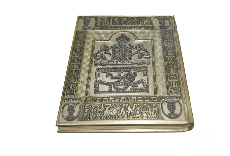 Decorated silver Passover Haggadah  Photograph by Ilan Rosen