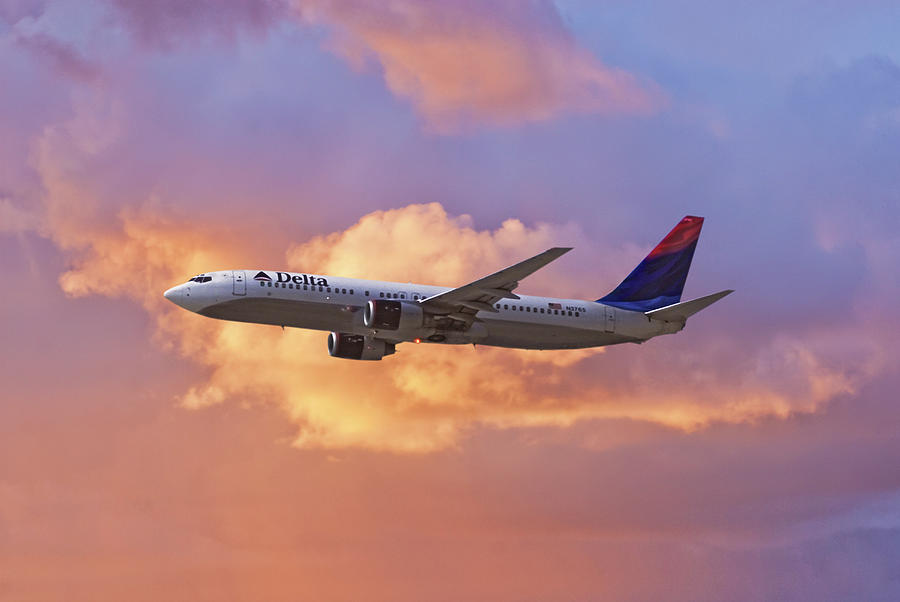 Flying the Sunset - Delta Air Lines Boeing 737 Photograph by Erik Simonsen