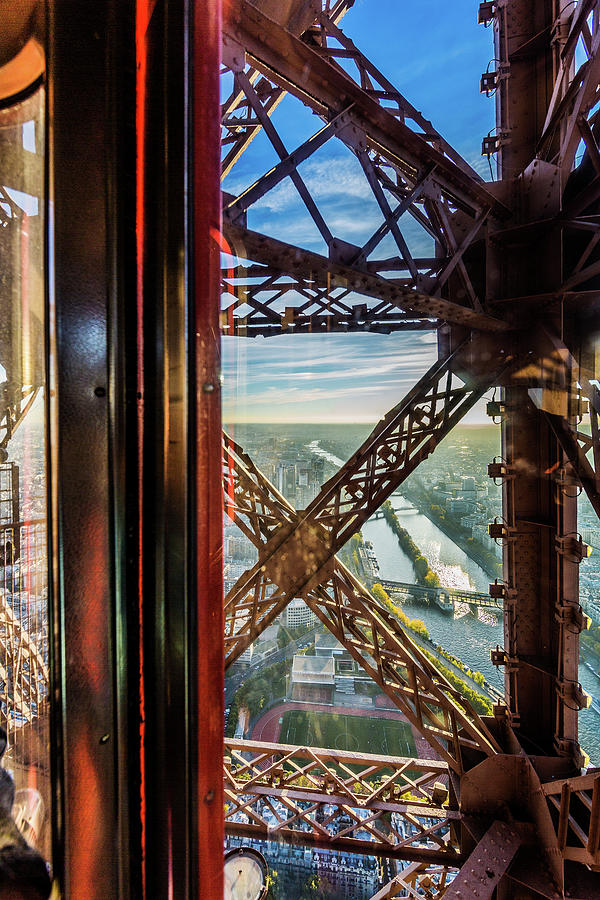 Descending in the lift of the Eiffel Tower, Paris. France. Photograph by Maggie Mccall