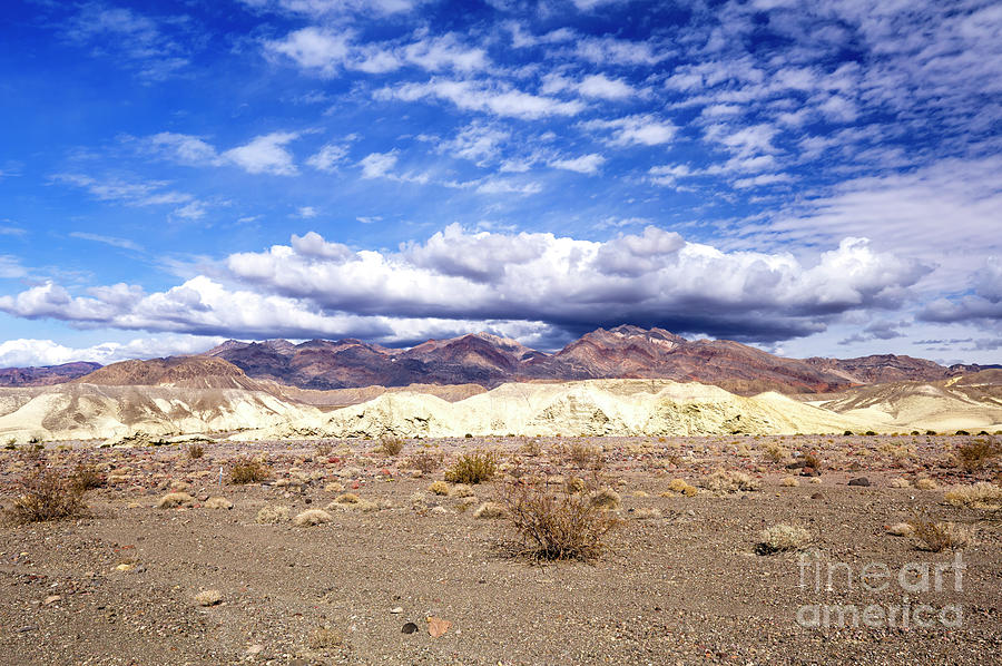 Desert Clouds at Death Valley Photograph by John Rizzuto