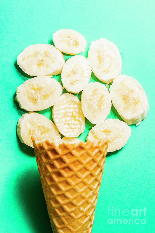 Banana Photograph - Dessert concept of ice-cream cone and banana slices by Jorgo Photography