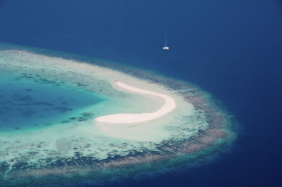Deserted Coral Island and Yacht Photograph by Jenny Rainbow