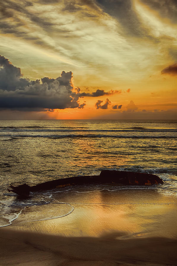 Beach Photograph - Destruction of an Outer Banks Shipwreck by Dan Carmichael