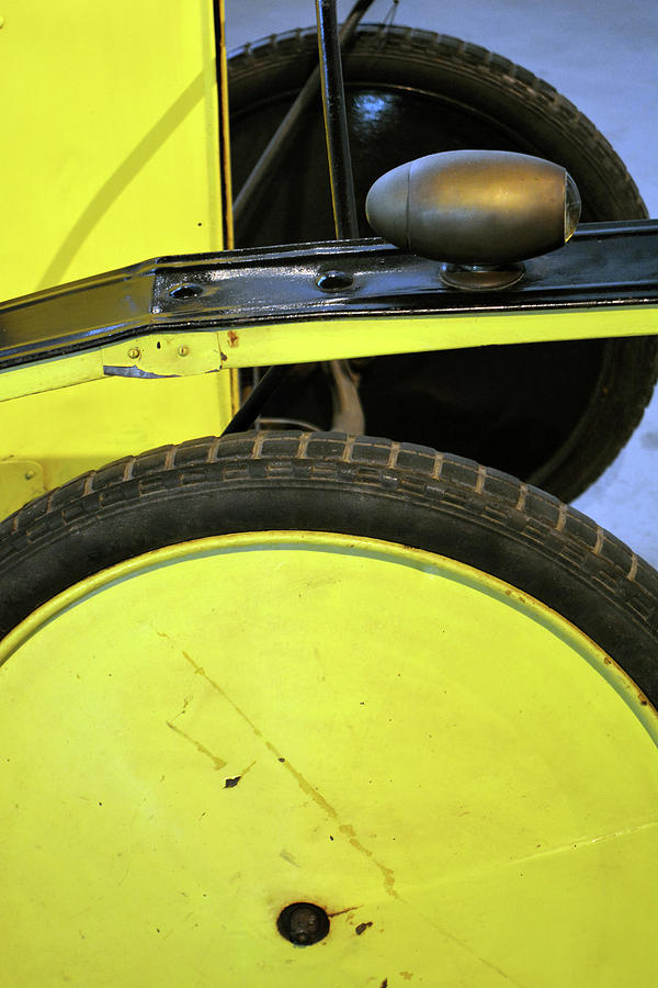 Detail of vintage yellow car wheels Photograph by Oana Unciuleanu ...