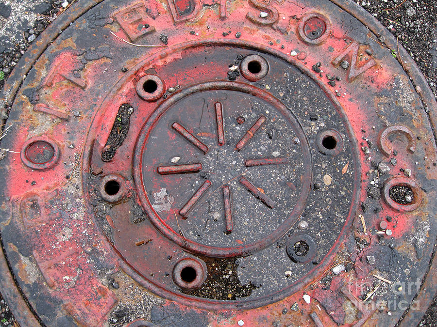 Detroit Edison Co. Manhole Cover After the Rain Photograph by Sandra Church