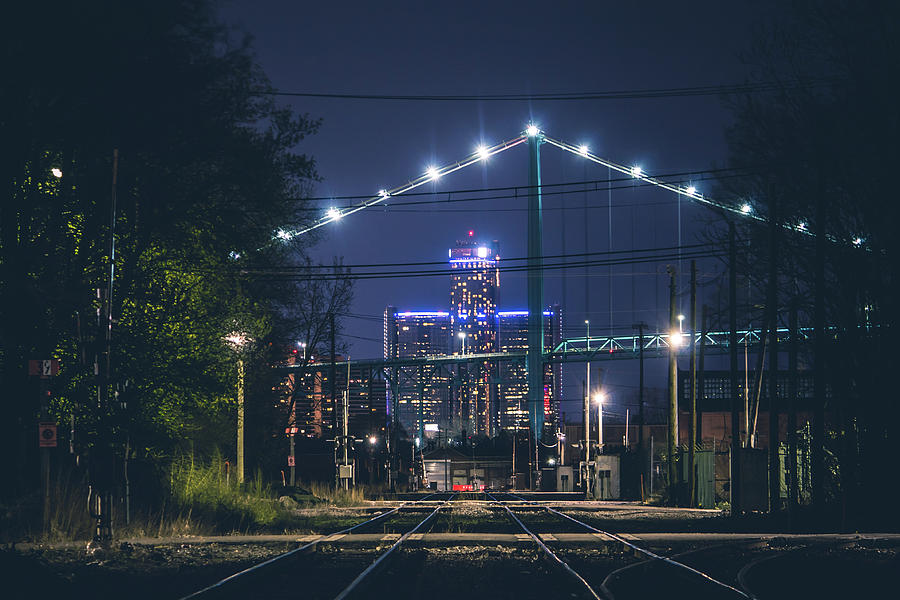 Detroit from the rails at night Photograph by Jay Smith
