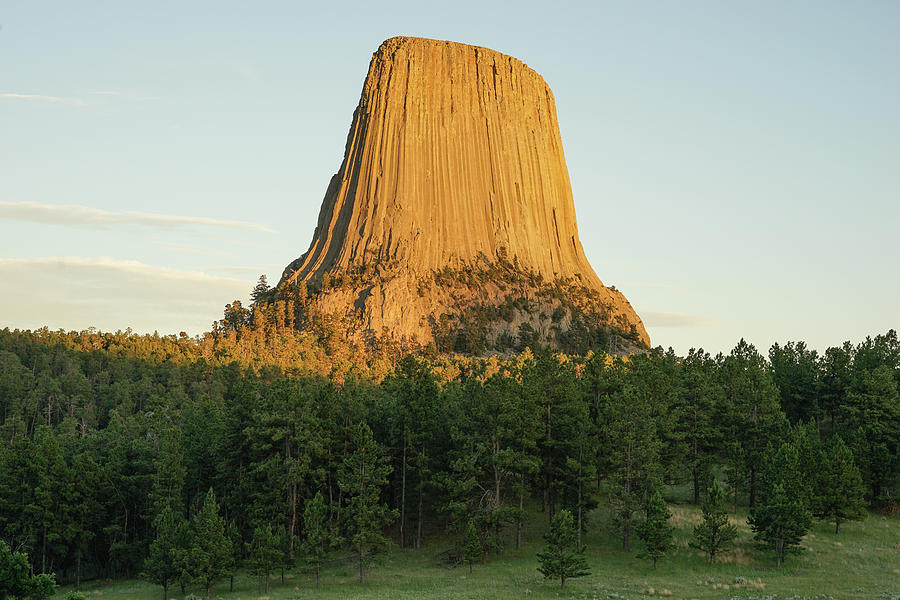 Devils Tower at sunset Photograph by Bill Gabbert