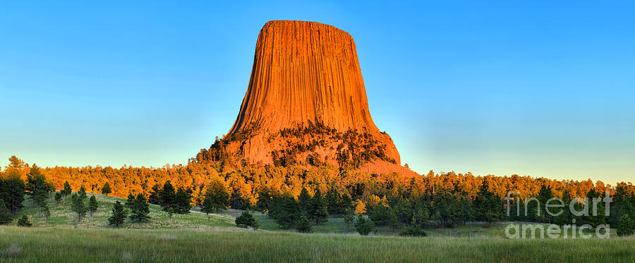 Devils Tower Golden Glow Photograph by Adam Jewell