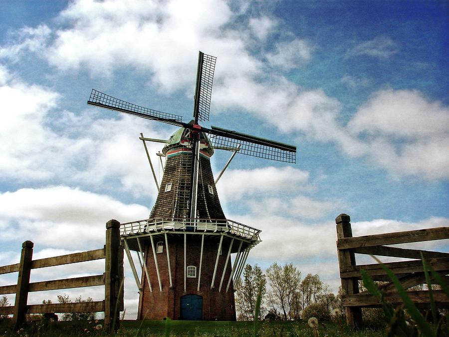 Dezwaan Windmill With Fence And Clouds Photograph