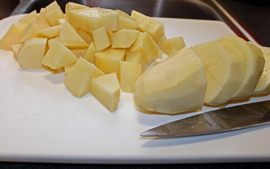 Dicing Potatoes I Photograph by Michiale Schneider