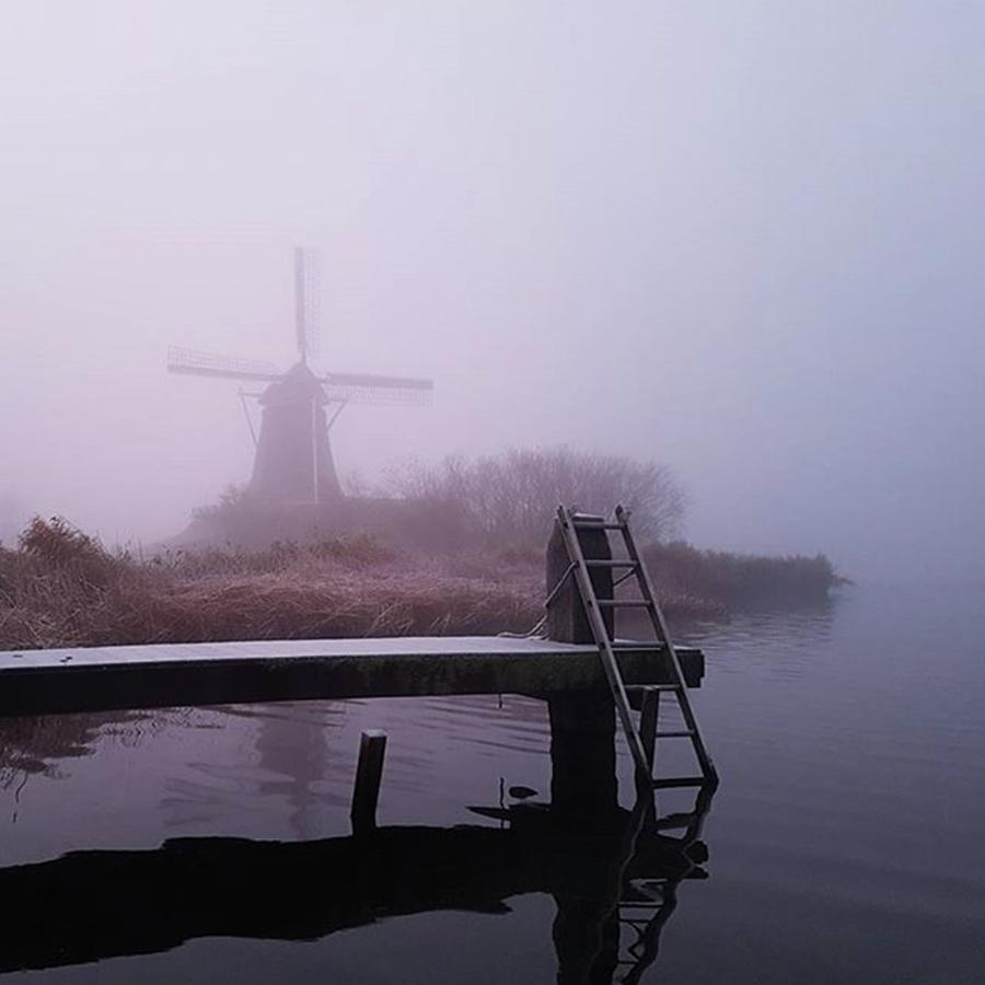 Landscape Photograph - Windmill in the fog by Peter Haitsma
