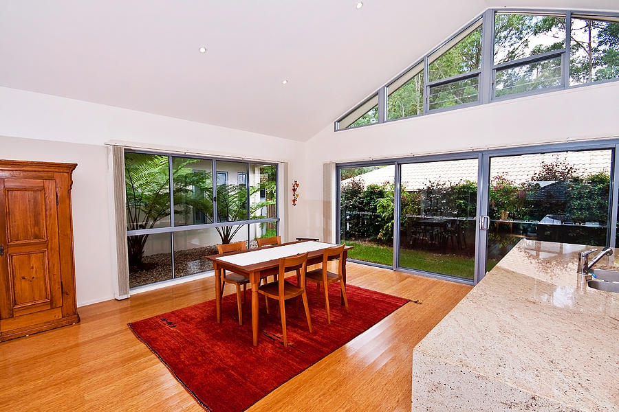 Dining Room With Slanted Ceiling