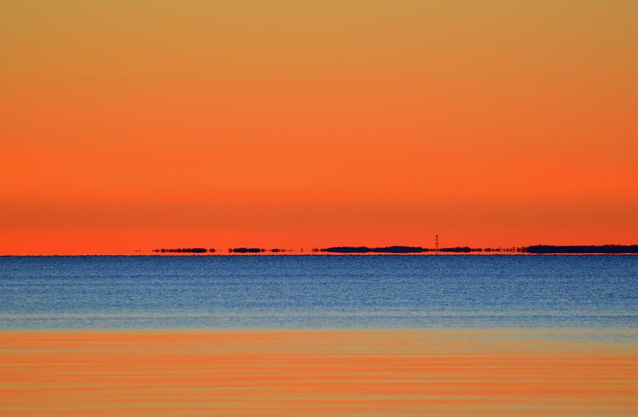 Distant Shore Before Sunrise  Photograph by Lyle Crump