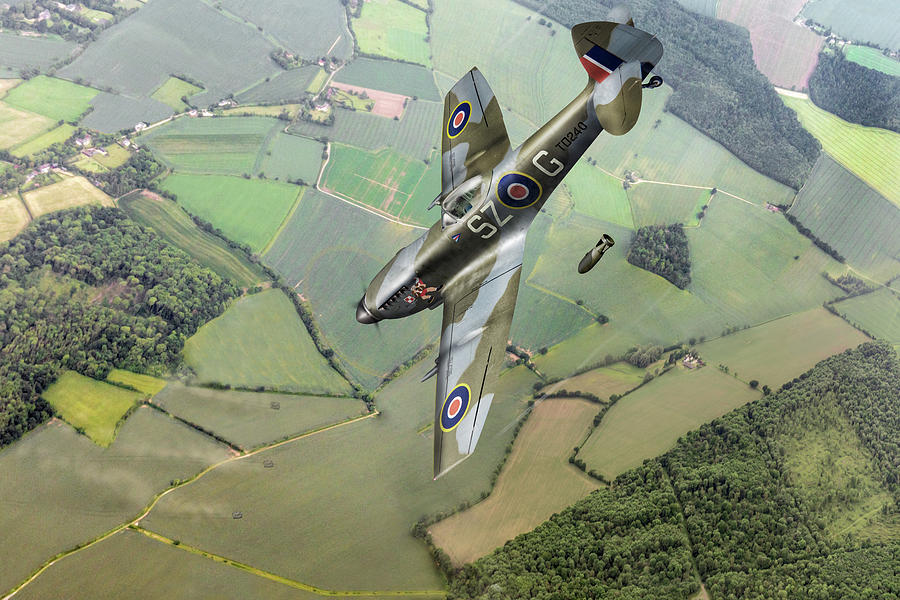 Dive bombing Spitfire Photograph by Gary Eason
