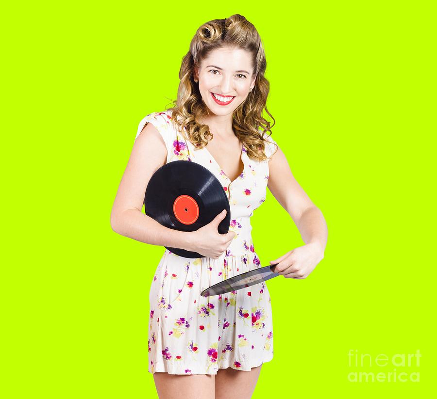 DJ disco pin-up girl rocking out to retro vinyl  Photograph by Jorgo Photography