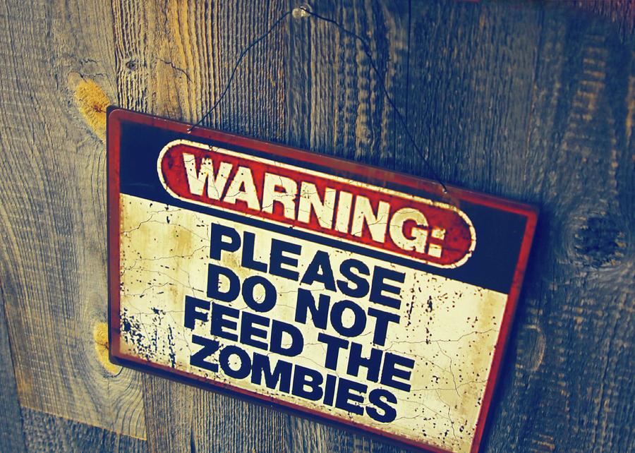 Do Not Feed The Zombies Photograph by Ely Arsha