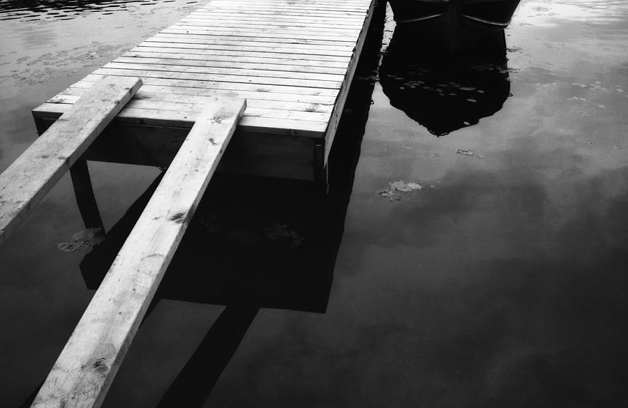 Dock And Water  Photograph by Lyle Crump