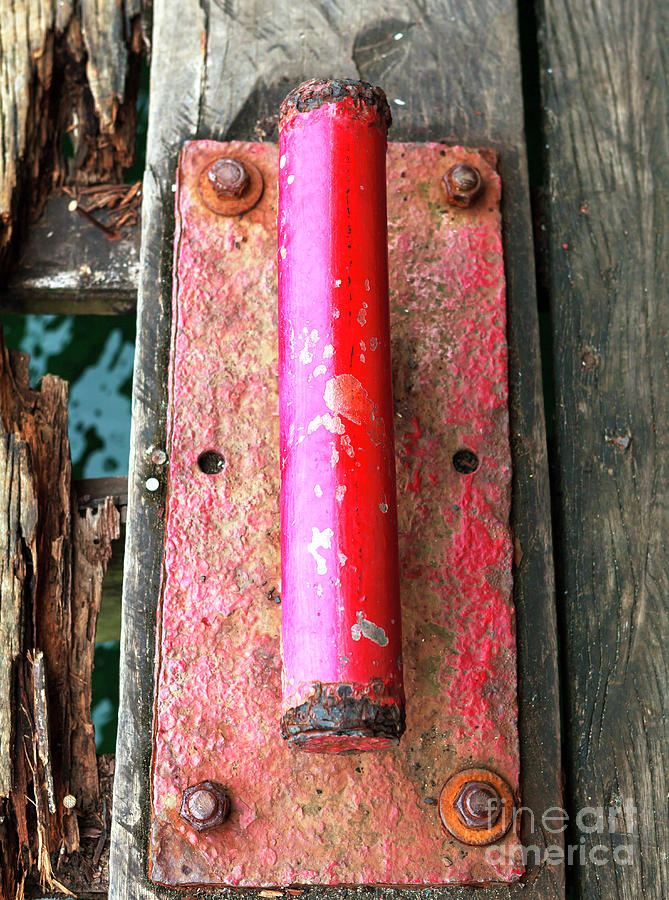 Dock Cleat at Bocas del Toro Photograph by John Rizzuto