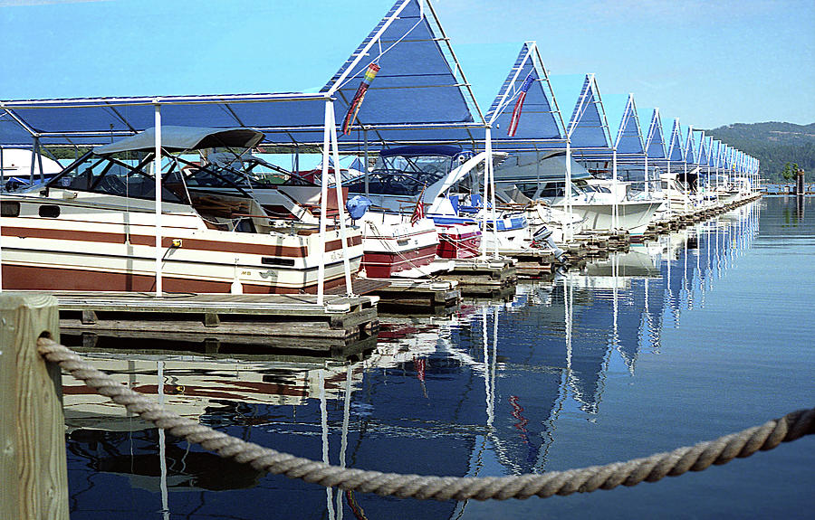 Docked boats Photograph by Emanuel Tanjala