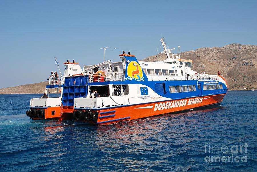 Docking ferry on Tilos Photograph by David Fowler