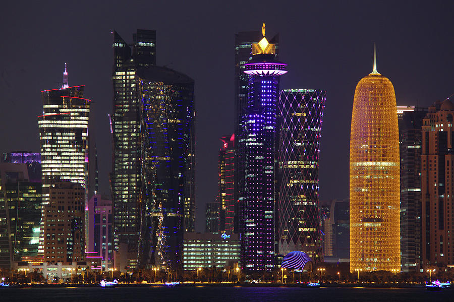 Doha towers at night Photograph by Paul Cowan