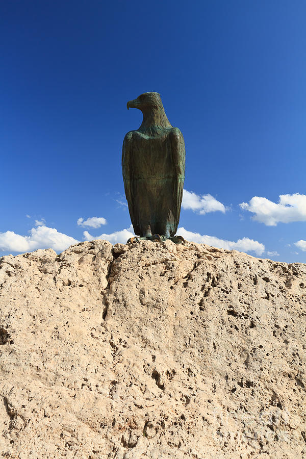 Dolomites - Bronze eagle  Photograph by Antonio Scarpi
