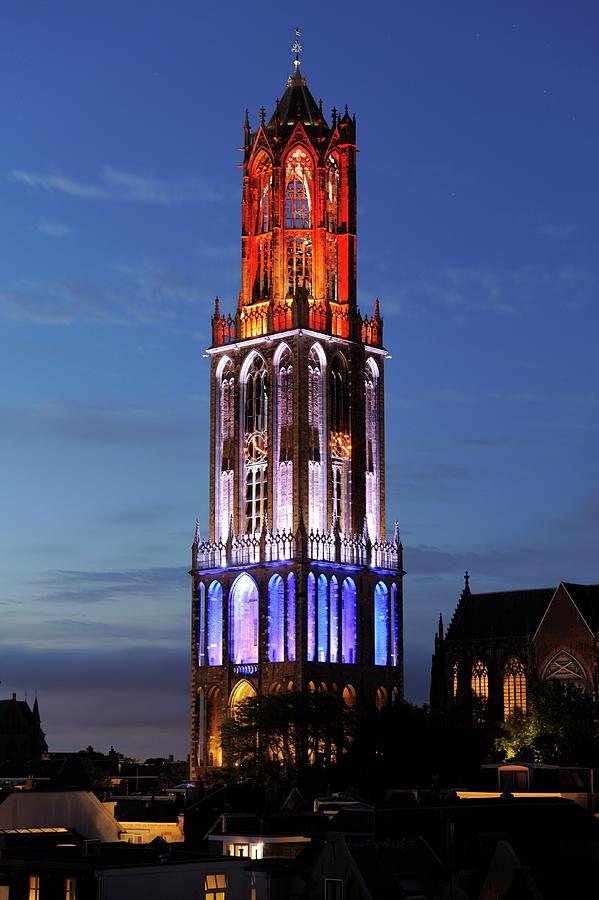 Dom Tower in Utrecht in red white and blue at dusk 286 Photograph by Merijn Van der Vliet