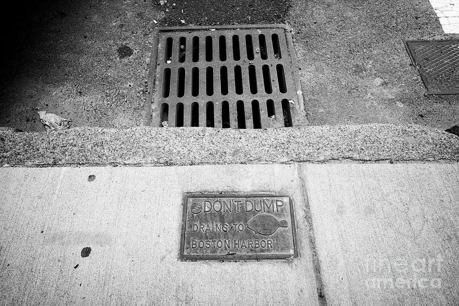 Boston Photograph - dont dump drains to boston harbor sign next to street level storm water drain Boston USA by Joe Fox