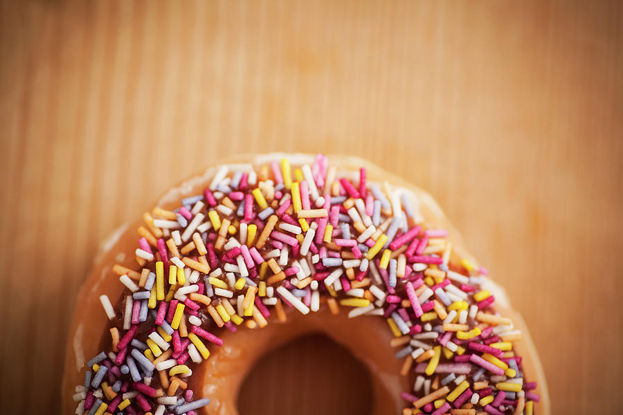 Donut And Sprinkles Photograph