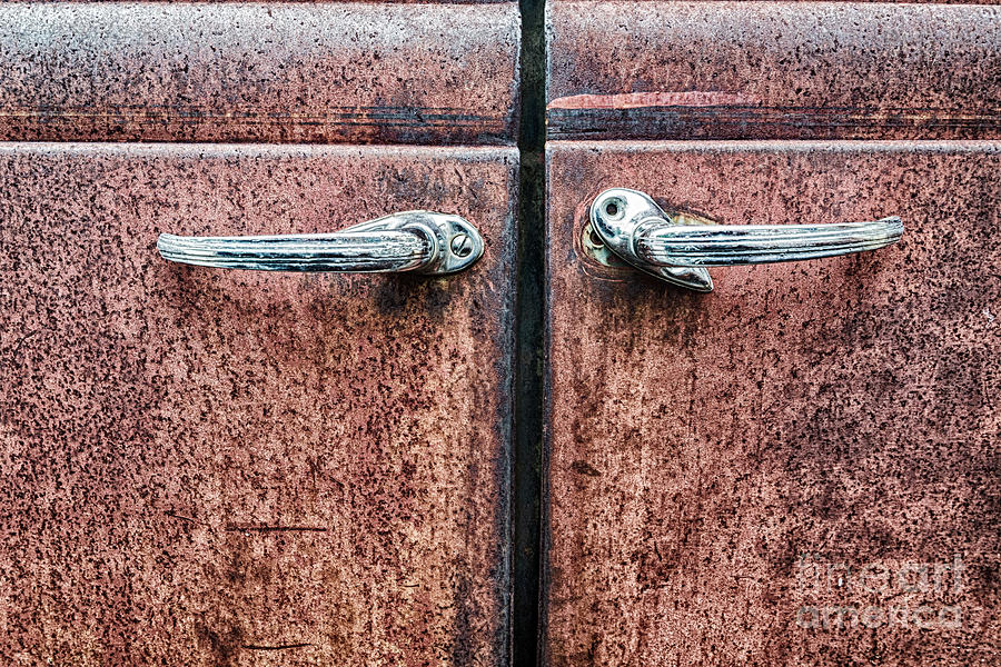 Abandoned Door handles Photograph by Paul Quinn