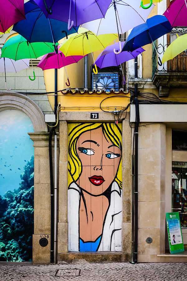 Floating Umbrellas Photograph - Door No 73 And The Floating Umbrellas by Marco Oliveira Floating Umbrellas Photograph - Door No 73 And The Floating Umbrellas by Marco Oliveira
