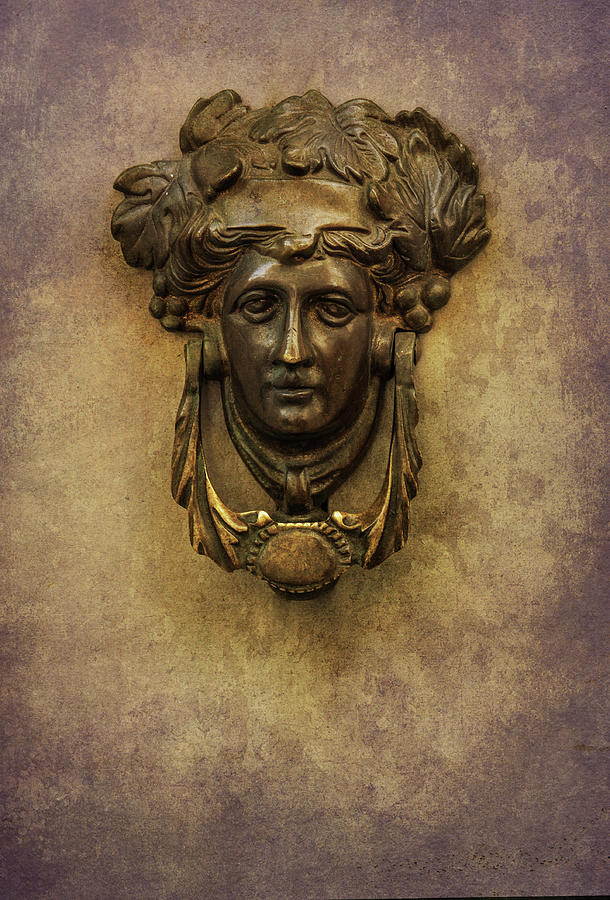 Doorknob with woman head Photograph by Jaroslaw Blaminsky