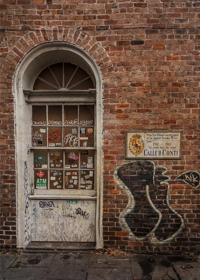 Doorway - Stickers, Graffiti and Brick Photograph by Patti Deters