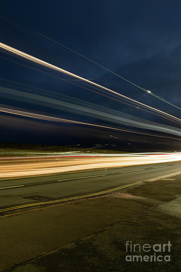 Double Decker light streaks Photograph by Clayton Bastiani