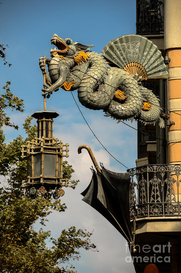 Dragon and umbrella sing in Barcelona Photograph by RicardMN Photography