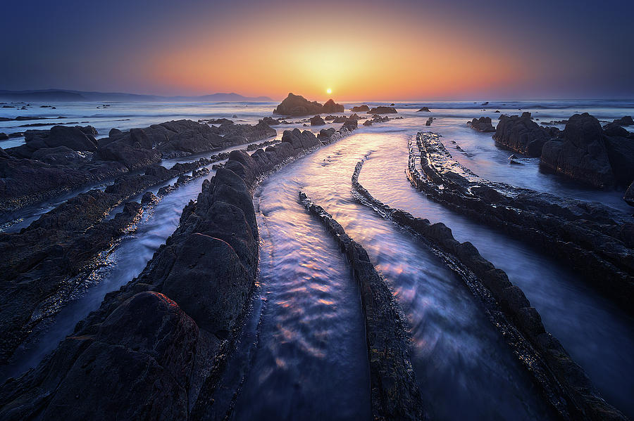 Sunset Photograph - Dragon Lair by Mikel Martinez de Osaba