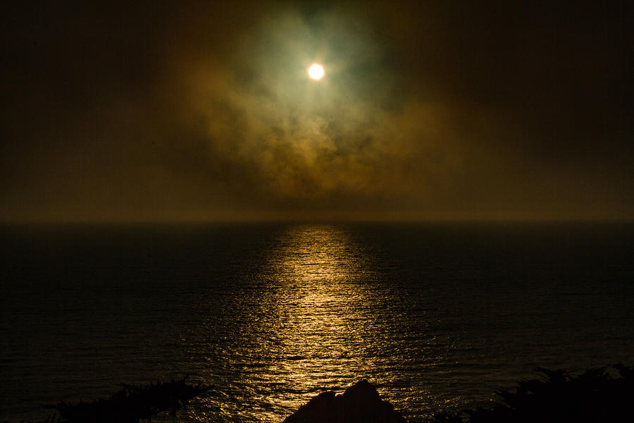 Drama of the Setting Sun Photograph by Bonnie Follett