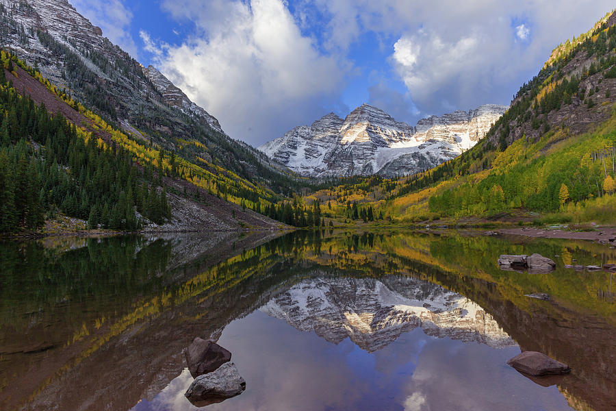 Dramatic Light Falls Upon the Maroon Bells Photograph by Bridget Calip ...